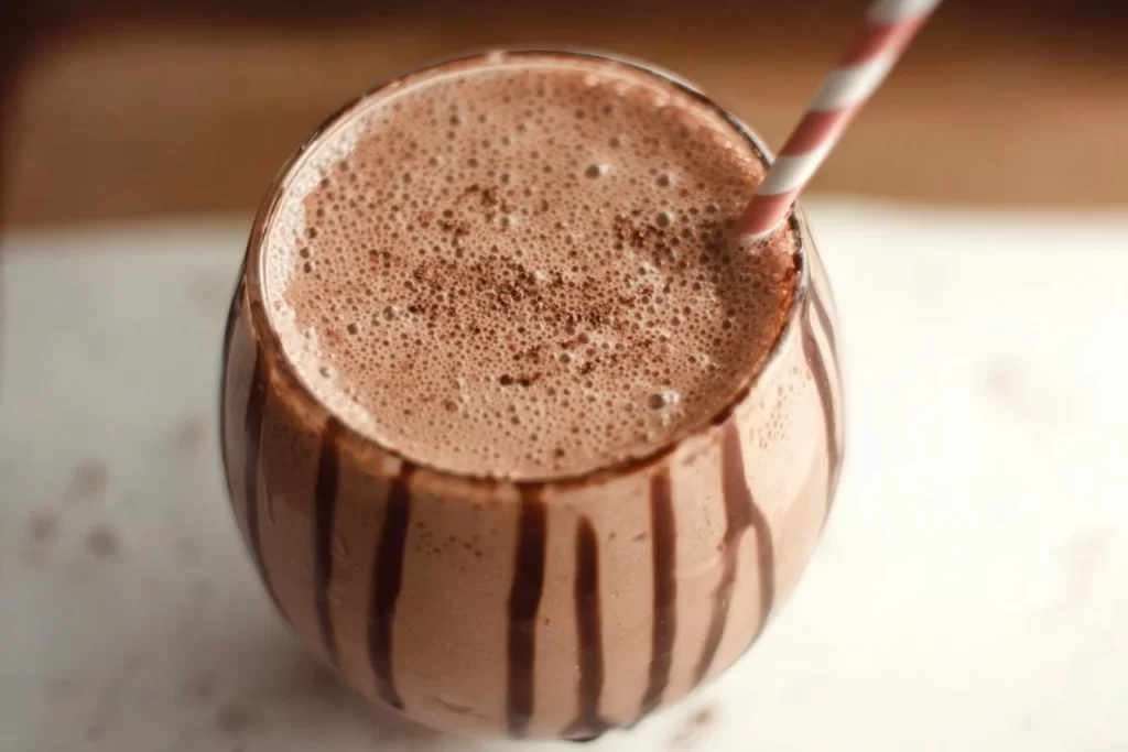 Healthy chocolate milkshake with nutritious ingredients in a glass