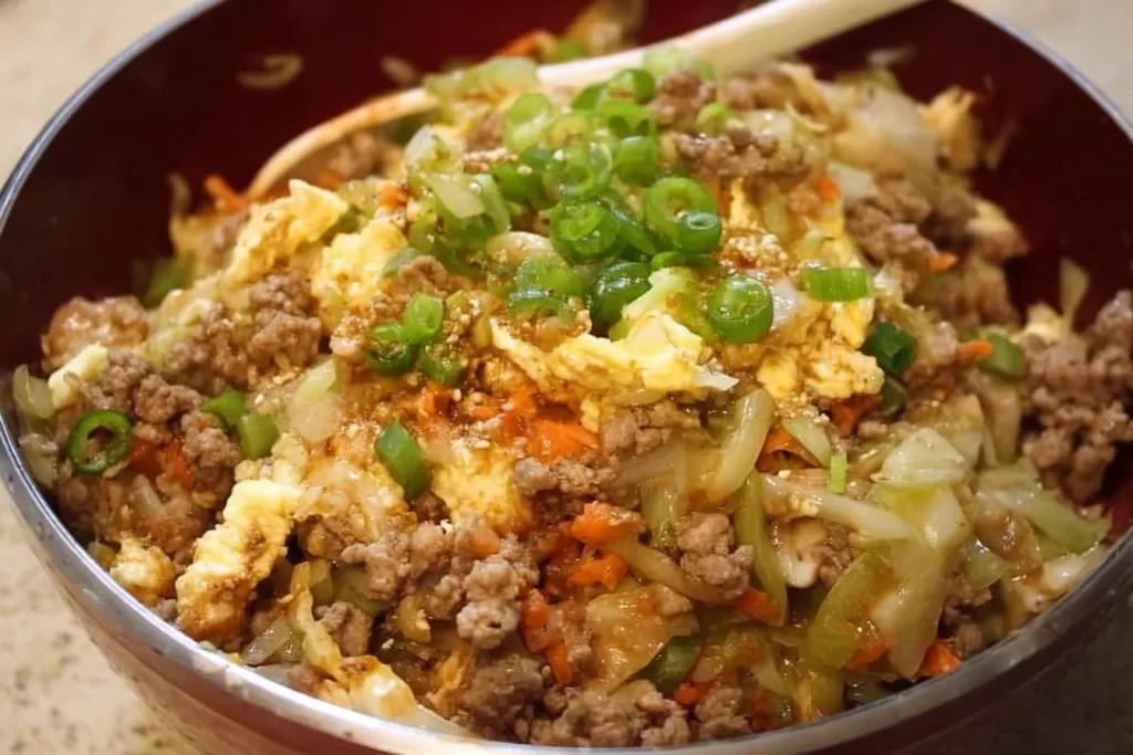 Delicious egg roll in a bowl recipe with colorful vegetables and savory meat