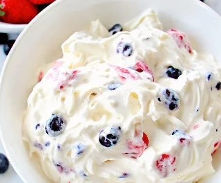 Delicious Keto Patriotic Cheesecake Salad with fresh berries and whipped cream